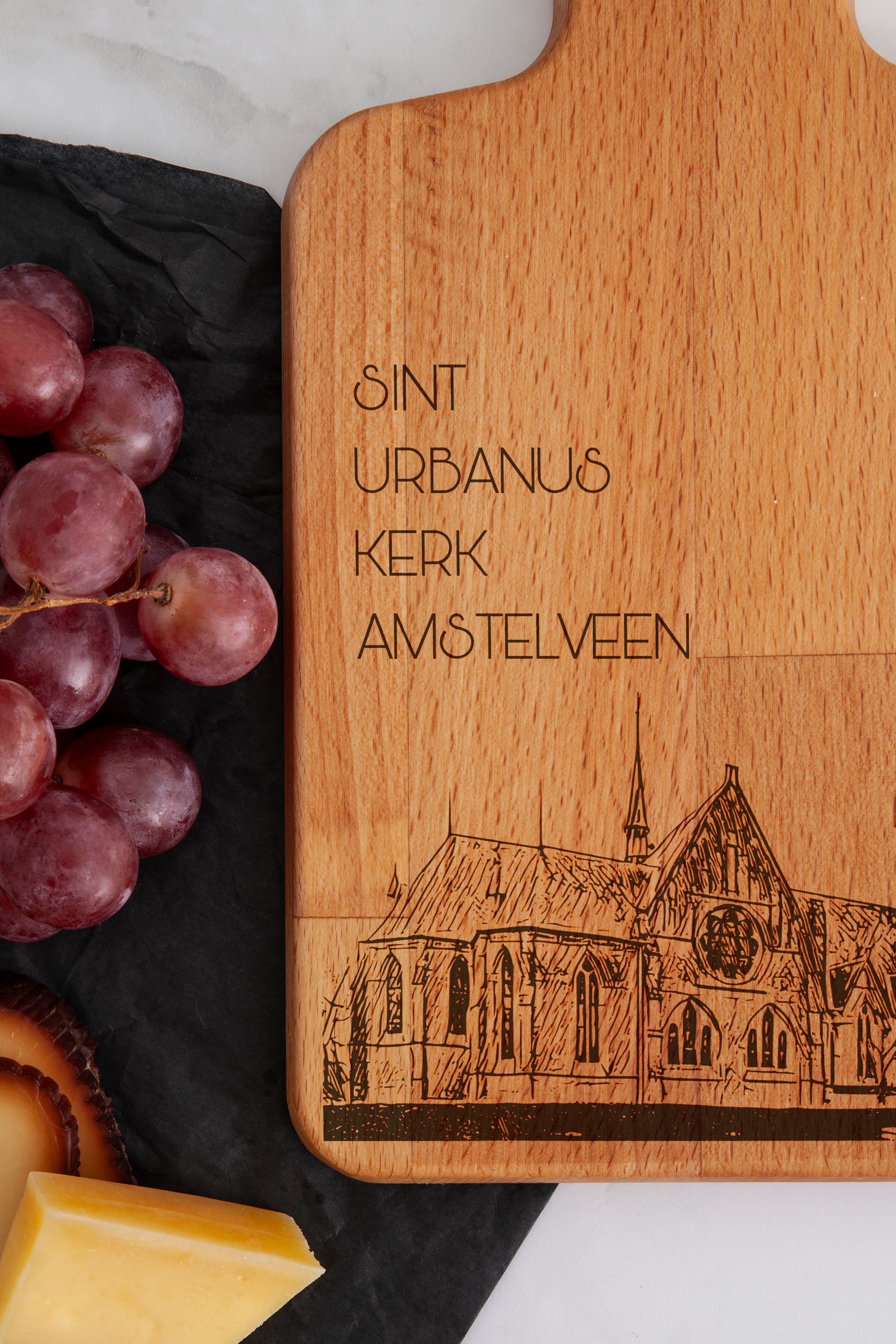 Amstelveen, Sint Urbanuskerk, cheese board, close-up